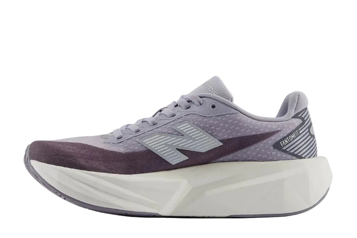 Gray running shoe with white sole on a white background